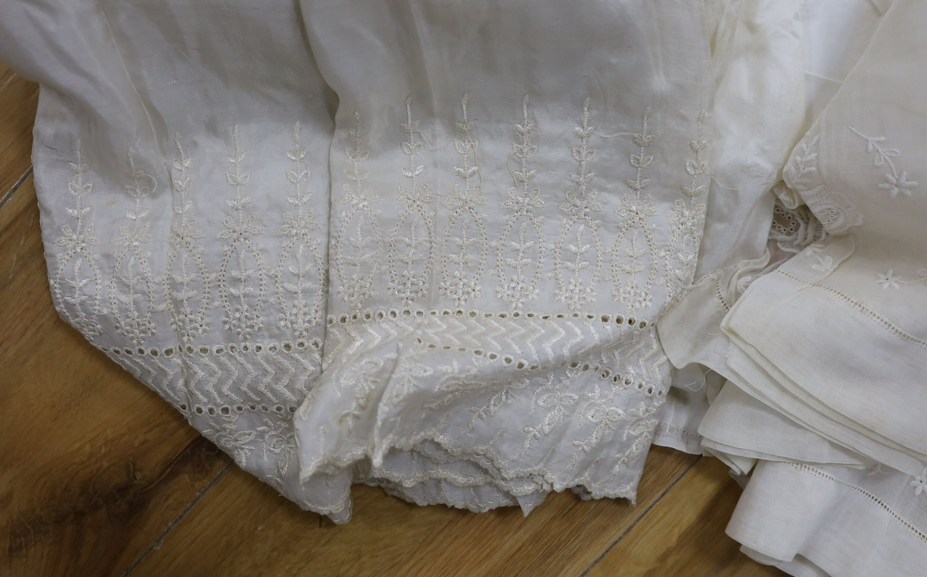 A collection of chemise/pantaloon lace inserted undergarments and a collection of petticoat flounces